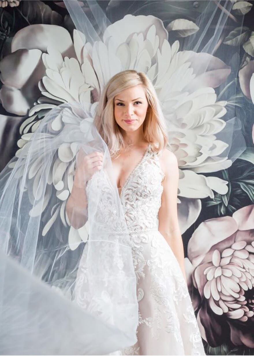 Model wearing a Rina's bridal dress